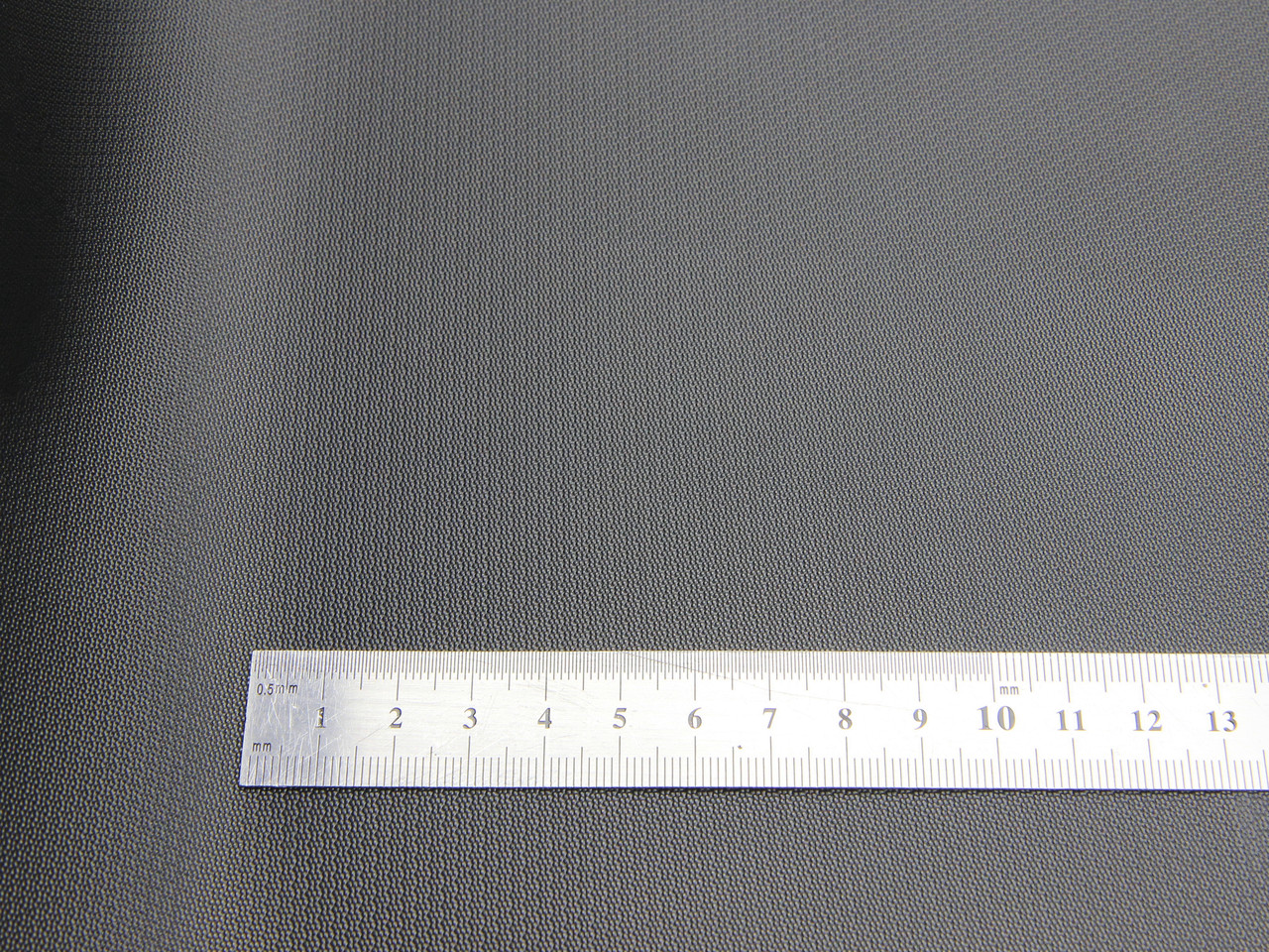 Термовинил черный (узор Ballistic tk-23) на каучуковой основе для перетяжки руля, дверных карт, шир. 140см детальная фотка