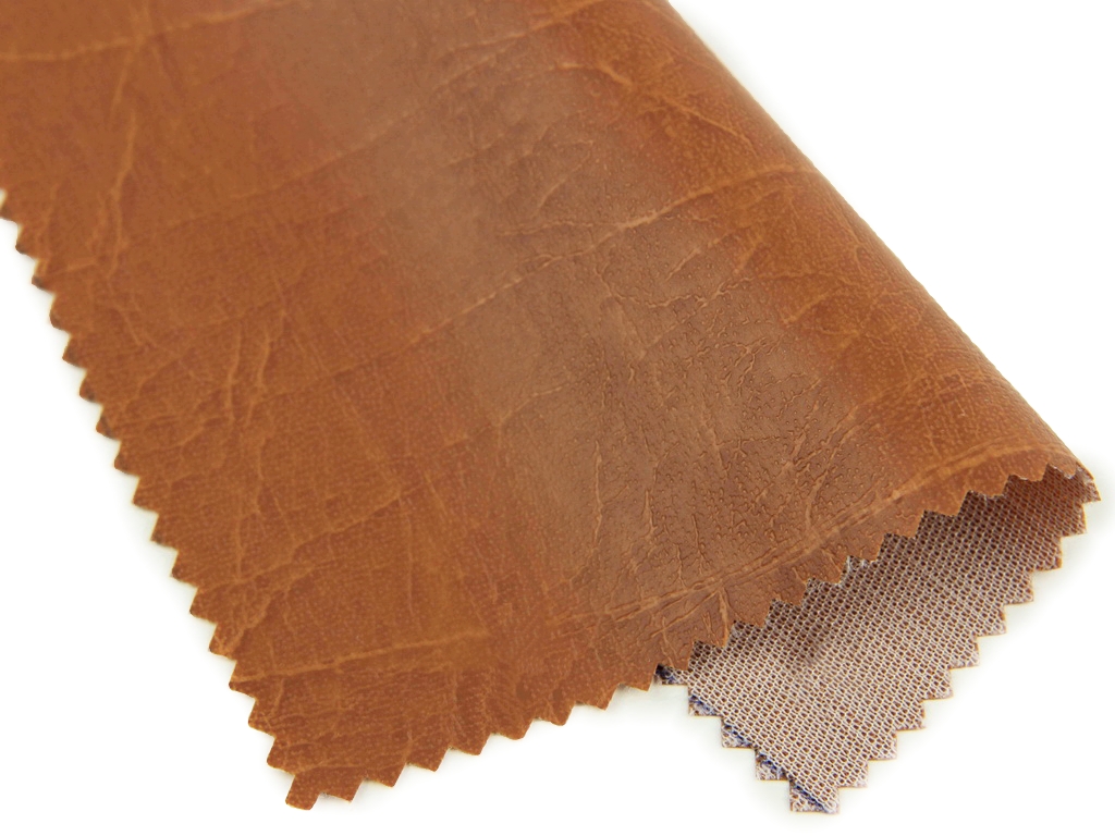 Шкірвініл меблевий гладкий (жовто-коричневий Н-Е4) для перетяжки м'якого куточка, дивана, стільців, ширина 1.4м детальна фотка
