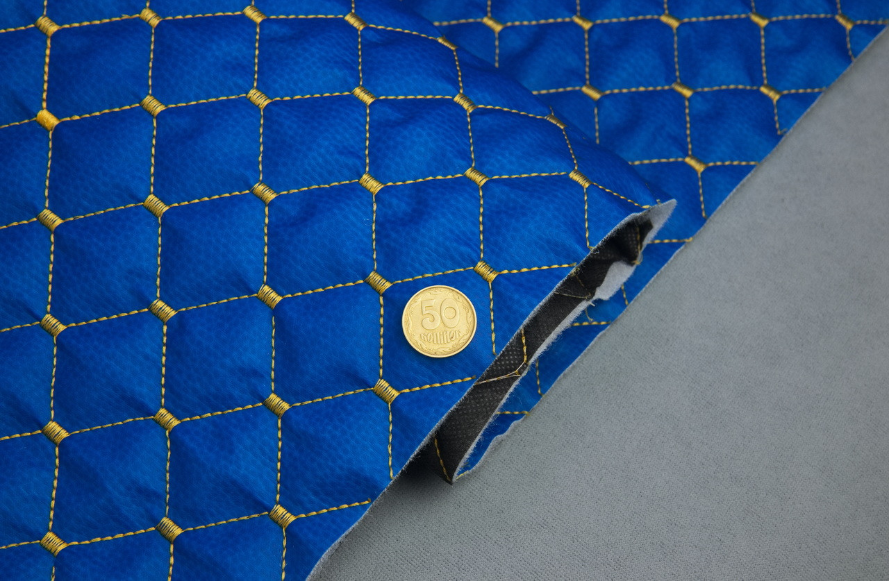 Кожзам стёганый синий «Ромб» (прошитый желтой нитью) дублированный синтепоном и флизелином, ширина 1,35м детальная фотка
