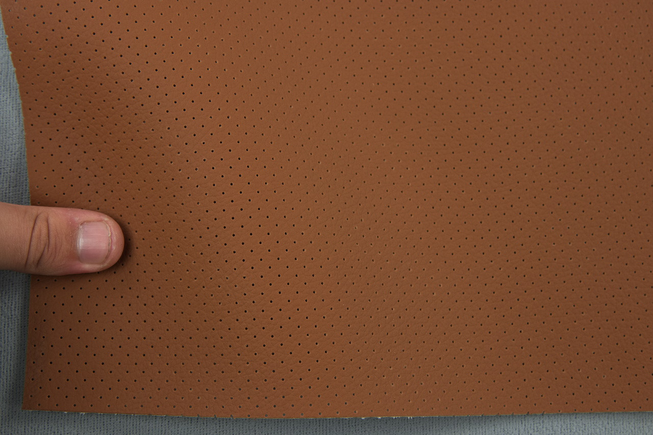Автомобільний шкірзам перфорований 9162p рудий на тканинній основі (ширина 1,40 м) Туреччина детальна фотка