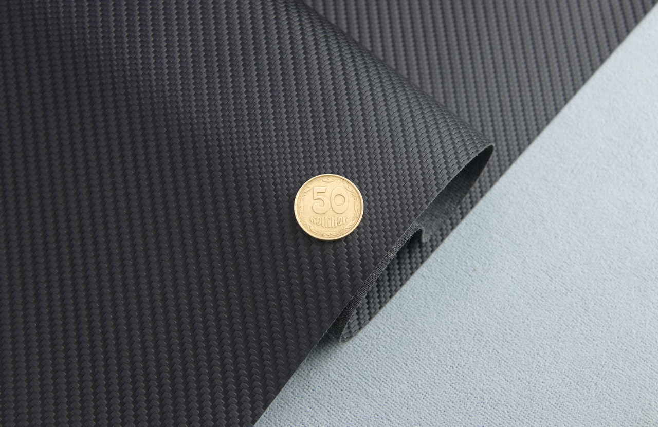 Автомобильный кожзам KARBON 901 черный, на тканевой основе, ширина 140см, Турция детальная фотка