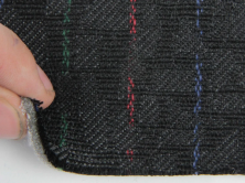 Тканина для сидінь автомобіля, колір чорний з кольоровими смужками, на поролоні (для центральної частини) анонс фото