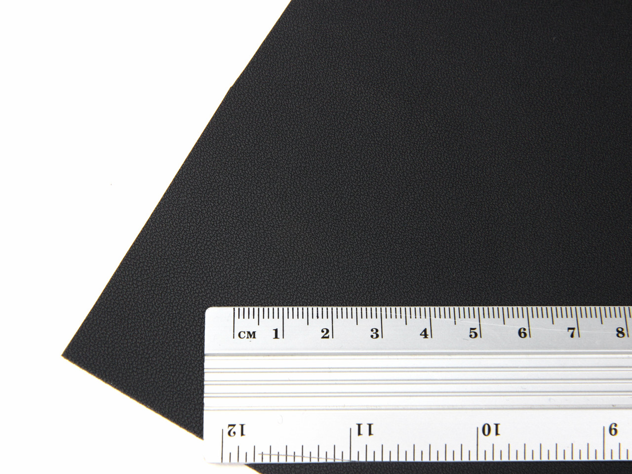 Термовинил черный, полуматовый (мелко зернистый tk-2m) для перетяжки руля, дверных карт, панелей на каучуковой основе детальная фотка