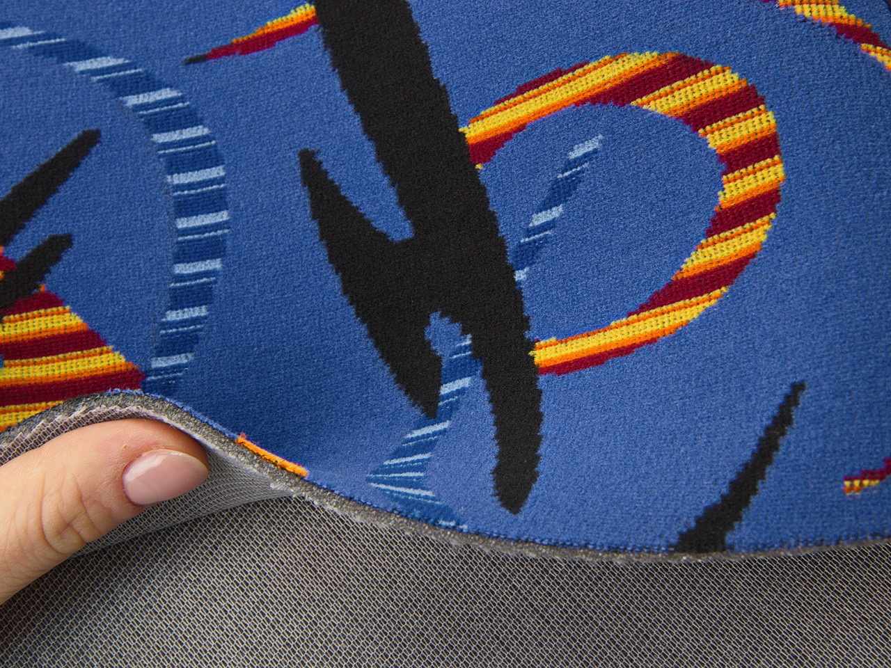 Автовелюр кольоровий Neoplan 45.01.99.99. на поролоні і сітці (тягучий), Польща детальна фотка