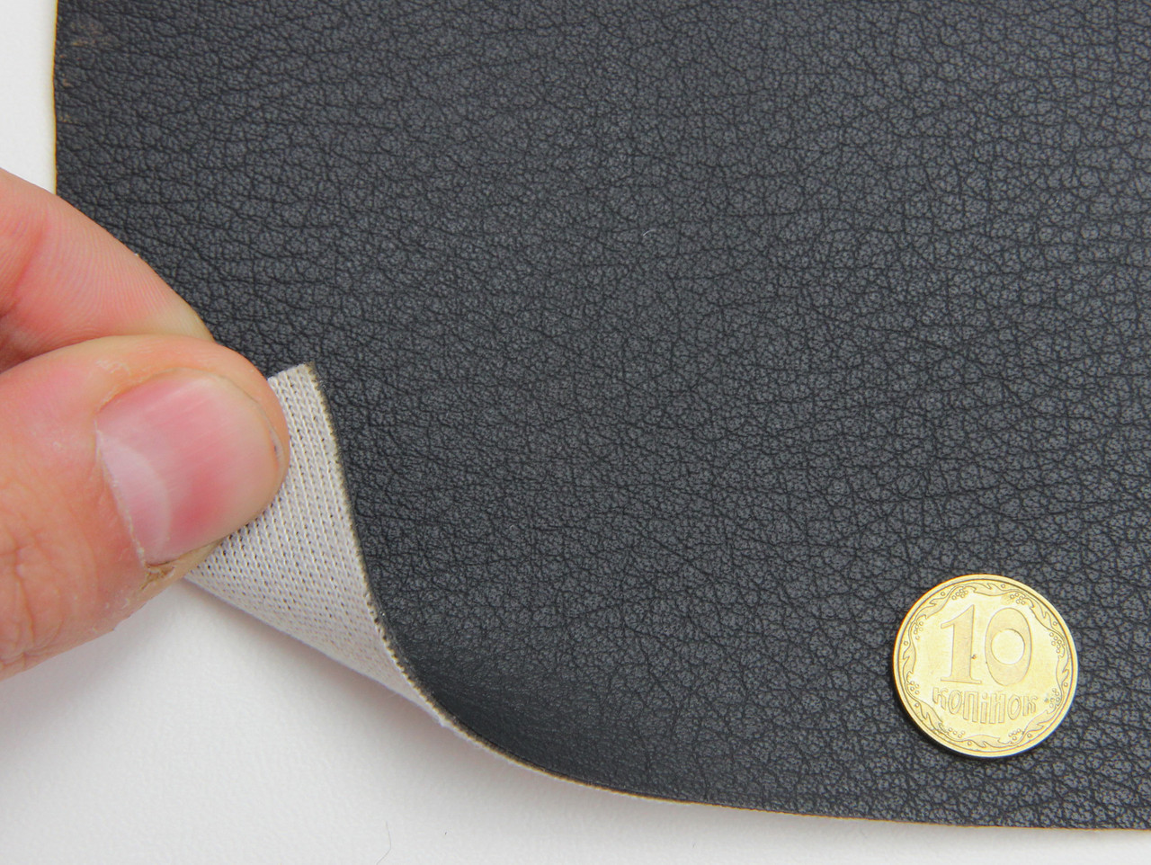 Шкірзам чорний для сидінь авто (текстурний напівматовий 09-198) на тканинній основі, ширина 1.50м детальна фотка