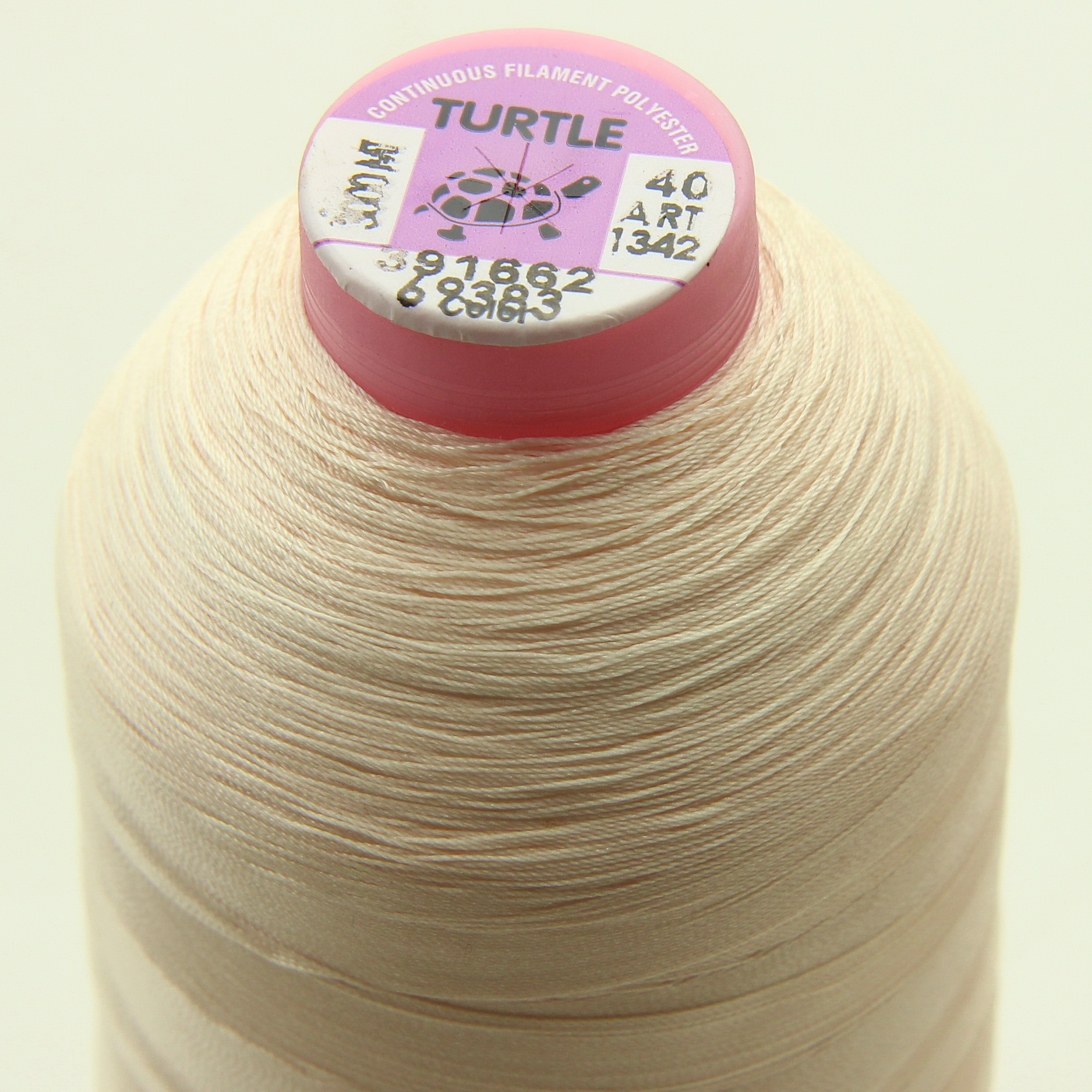 Нить TURTLE (Турция) №40 цвет 69383 кремовый для оверлока, длина 3000м. детальная фотка