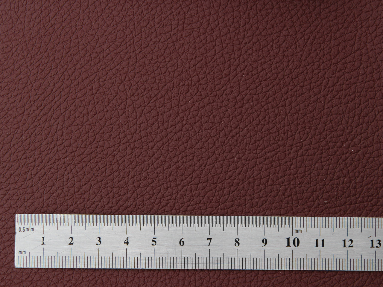 Автомобильный кожзам перфорированный DAKOTA 6616п бордовый, на тканевой основе (ширина 1,40м) Турция детальная фотка