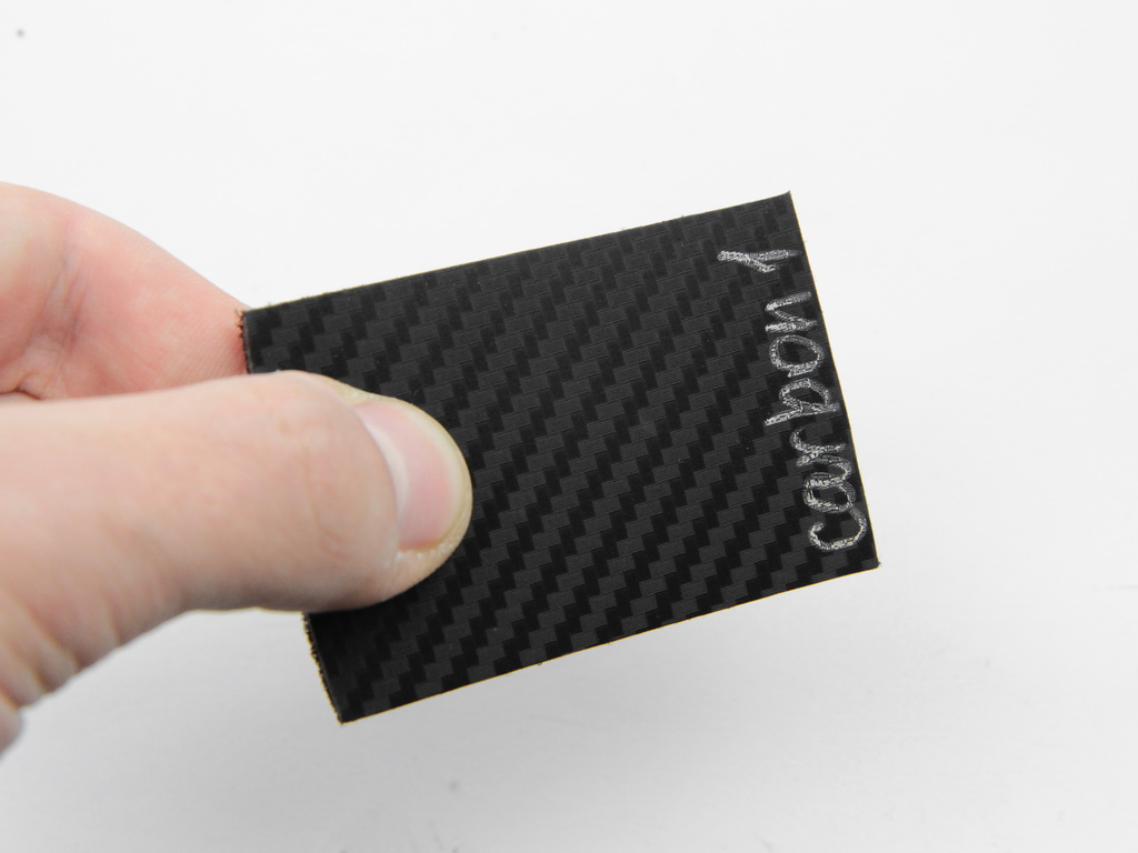 Авто кожзам под carbon черный, на тканевой основе (Германия carbon-1) детальная фотка