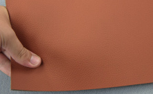 Автошкірзам оранжево-коричневий 7001-MT на поролоні 4мм і сітці, ширина 145см анонс фото