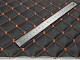 Кожзам стёганый черный «Ромб» (прошитый оранжевой нитью) дублированный синтепоном и флизелином, ширина 1,35м детальная фотка