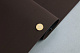 Термовинил темно-коричневый матовый под замш TK-27 для перетяжки руля, дверных карт, панелей на каучуковой основе детальная фотка