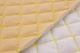 Кожзам стёганый бежевый «Ромб» (прошитый желтой нитью) дублированный синтепоном и флизелином, ширина 1,35м детальная фотка