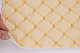 Кожзам стёганый светло-бежевый «Ромб» (прошитый тёмно-золотой нитью) дублированный синтепоном и флизелином, ширина 1,35м детальная фотка